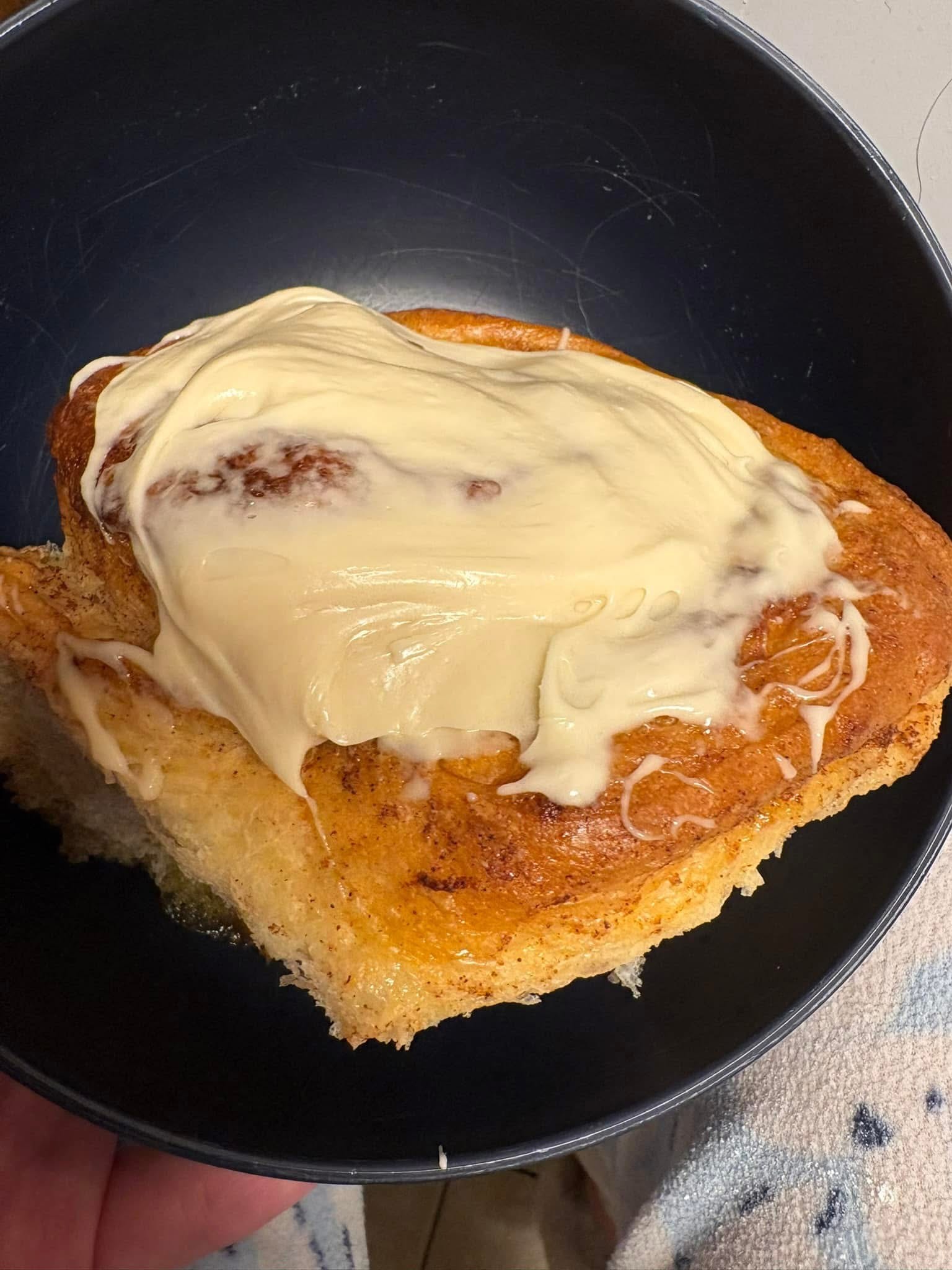 Fresh cinnamon rolls with cream cheese icing